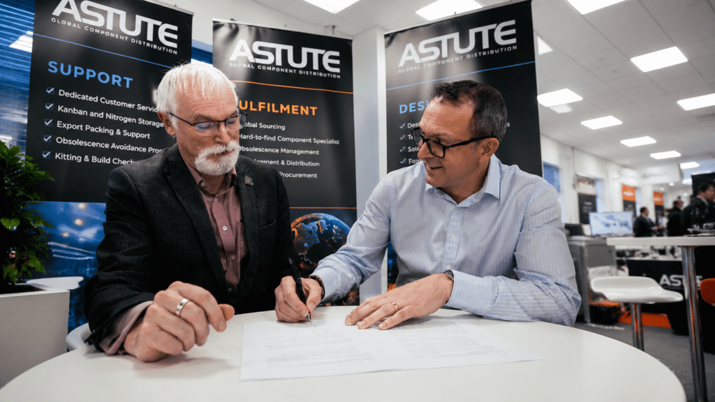 Astute Group representatives signing a supply chain partnership agreement