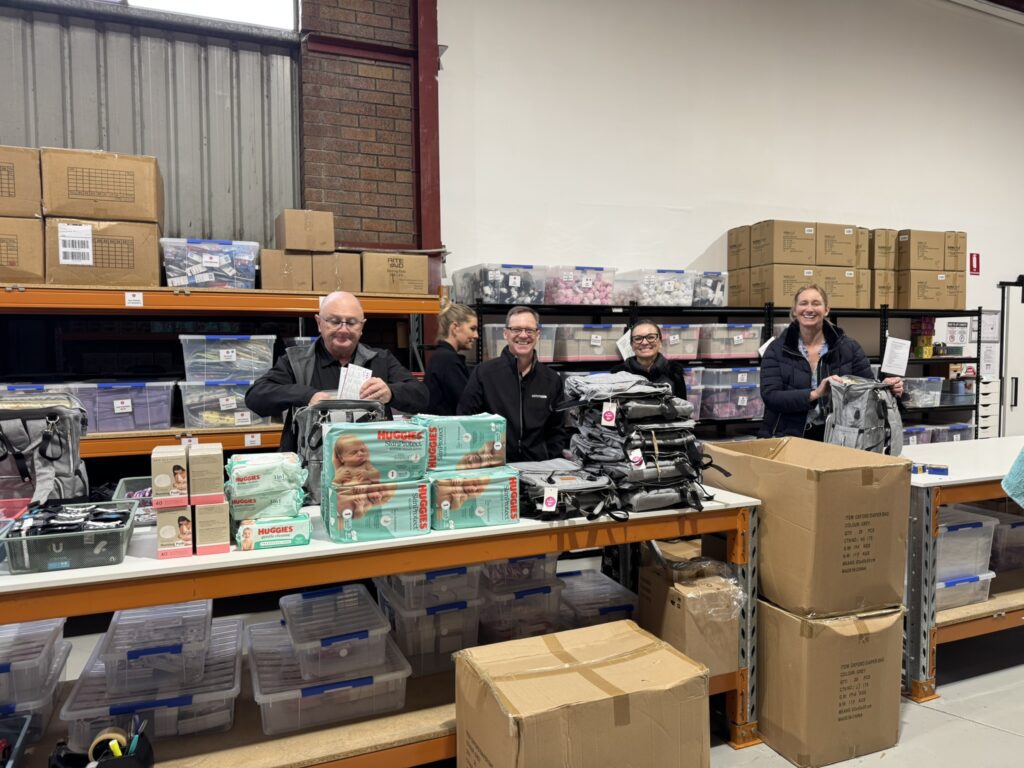 Astute Pty and Hark Communications volunteers supporting Brave New Life warehouse packing activities